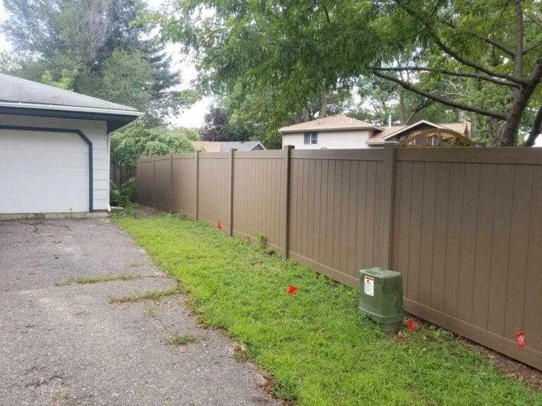 5 Ways to Clean Your Vinyl Fence Without Killing Grass